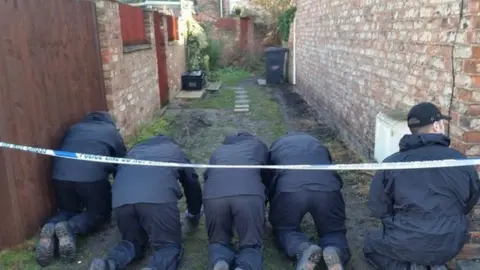 Police searching alleyway near Claudia Lawrence's home in York