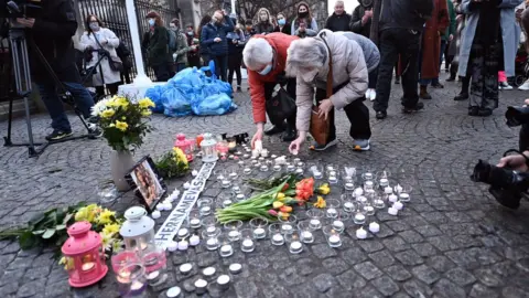 Pacemaker Flowers and candles were laid at Belfast City Hall