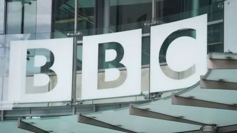 PA Media BBC logo outside New Broadcasting House in London