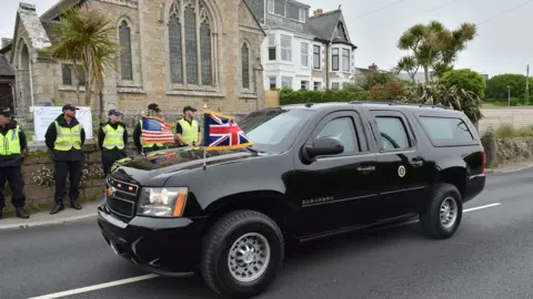 PA Media biden in an SUV