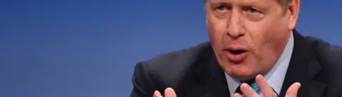 AFP Boris Johnson speaking as PM at the Conservative Party conference in 2019