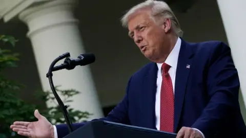 Getty Images Trump addresses press