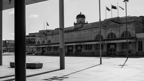 Tim Parfitt Cardiff’s Central train station and an empty Central Square