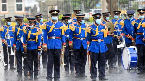 EPA Kenya's police band in the rain in Nairobi, Kenya - Wednesday 5 May 2021