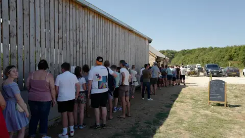 Getty Images Queues at Diddly Squat Farm