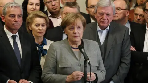 Getty Images German Chancellor Angela Merkel with CDU allies, 19 Nov 17