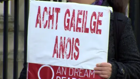 Protestor calling for Irish Language Act