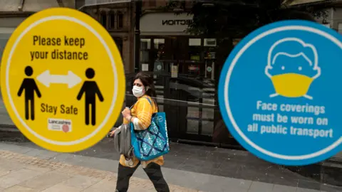 Getty Images A shopper in Preston