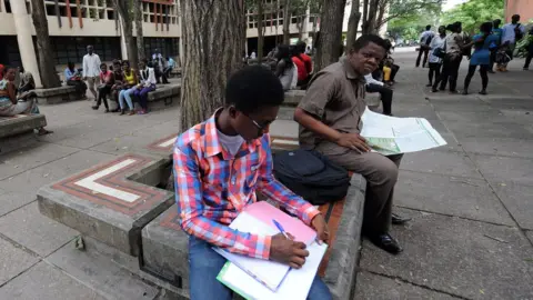 AFP Students read at the University of Lagos, 2012