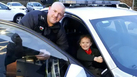 North Wales Police PC Robert Williams and Daisy Earp