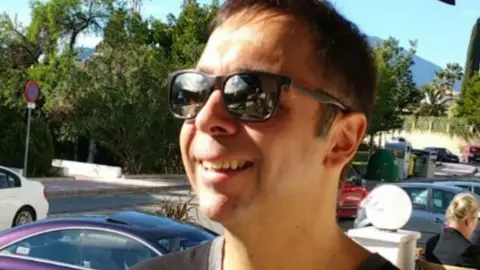 Family photo Sean Thweny smiling