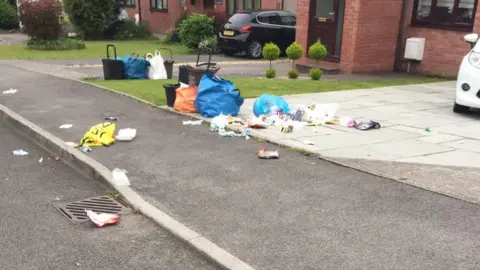 Gareth Davies Rubbish on street in Bryn Menin