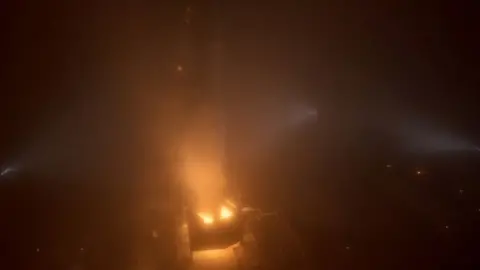 NASA The rocket launches, adding further to the "peasouper"