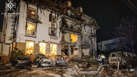 State Emergency Service of Ukraine/Reuters Hotel wrecked in missile strike on Kharkiv, 10 Jan 24