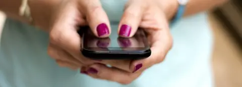 Getty Images Woman on smartphone