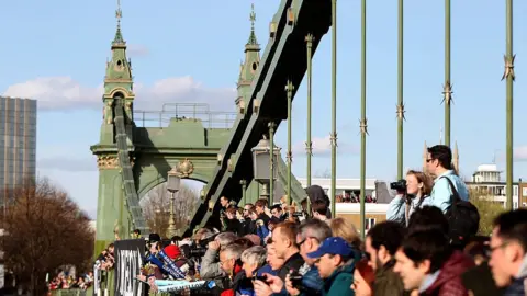 Getty Images Spectators on Hammersmith Bridge