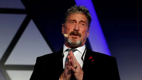 Reuters John McAfee, co-founder of McAfee Crypto Team and CEO of Luxcore and founder of McAfee Antivirus, speaks at the Malta Blockchain Summit in St Julian"s, Malta November 1, 2018