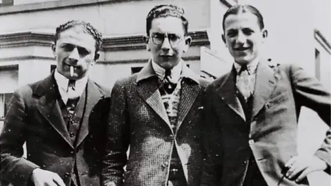 Geraldine Connon Sonny Leopold (centre) worked with his father at the tailoring company