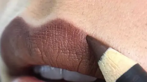 Matthew King woman's face with facial hair