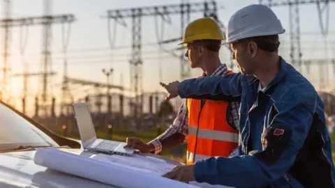 Getty Images Electricity grid workers