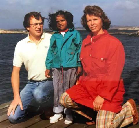 Kiran Gustafsson A young Kiran with her parents