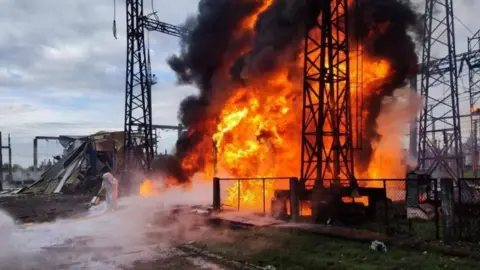 Ukrainian Presidential Press Service via Reuters A fire at an energy-generating facility in Ukraine. Photo: 22 October 2022