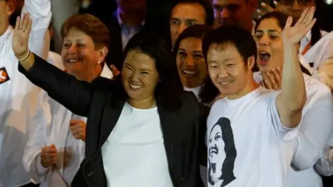 Reuters Peruvian presidential candidate Keiko Fujimori (L) and her brother and congressman Kenji attend a closing campaign rally in Lima, Peru, June 2, 2016