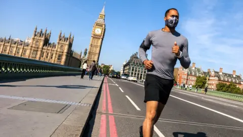 Getty Images Man runs on Westminster bridge