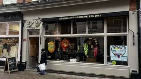 BBC The shop front of the chocolatiers