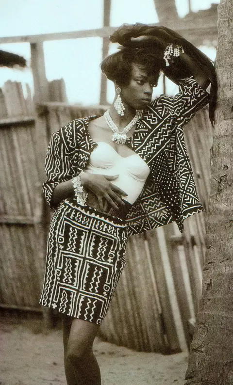 Africa Fashion at the V&A Woman wearing a skirt and a jacket