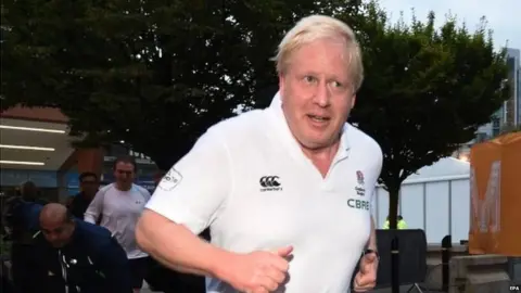 EPA Boris Johnson during a morning run in Manchester
