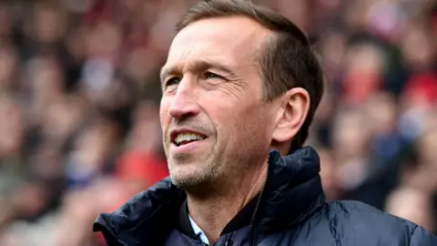 AFP Justin Edinburgh