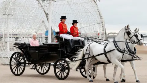 Reuters The Queen waxwork arriving in horse and carriage