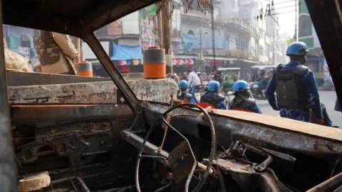 Anshul Verma Burnt police car