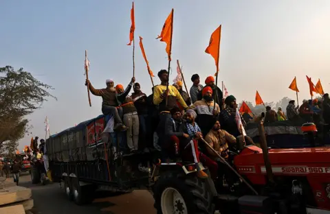 REUTERS/Danish Siddiqui Farmers take part in a tractor rally