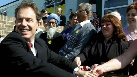 PA Tony Blair on the campaign trail in 2001