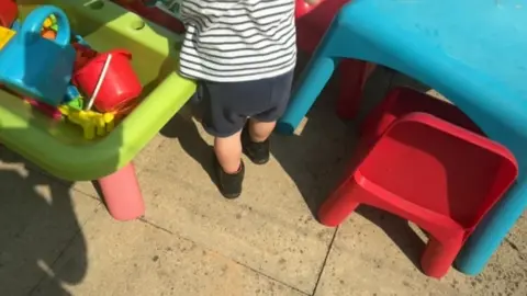 BBC Child playing with toys