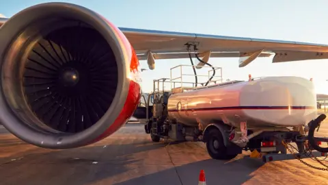 Getty Images Plane getting refuelled