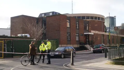 PA Media Police cordon outside church