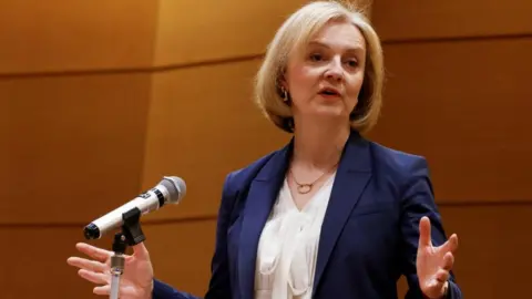 Reuters Liz Truss giving a speech