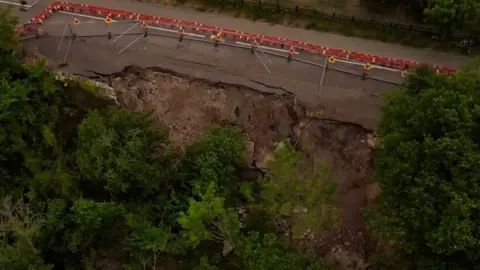 The collapsed road