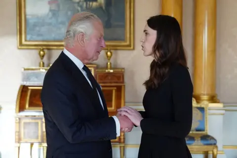 Reuters King Charles III speaks with Prime Minister of New Zealand, Jacinda Ardern, as he receives realm prime ministers in the 1844 Room at Buckingham Palace in London. Picture date: Saturday September 17, 2022.