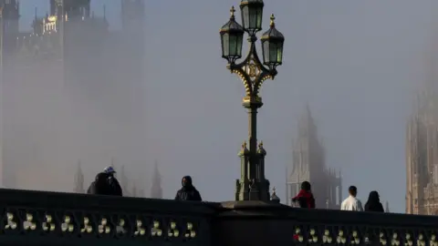 Getty Images People walking near Parliament