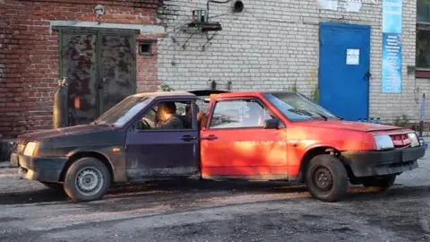 Garage 54 Three Russian cars welded together in an attempt to make a car-based fidget spinner