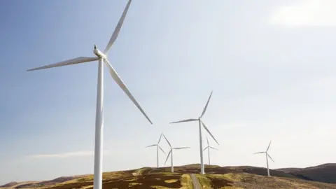 Getty Images Wind turbines