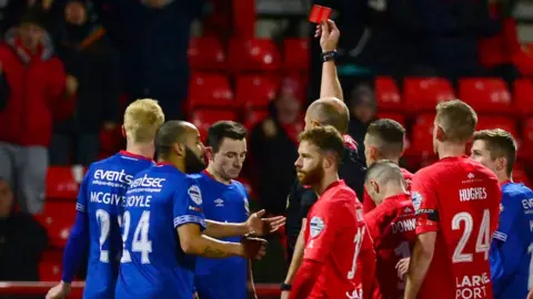 Linfield's Stephen Fallon is sent off