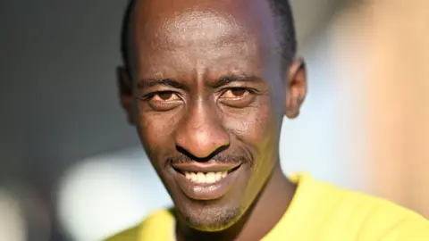 Getty Images Kelvin Kiptum of Kenya poses during a private photo shooting prior to World Athletics Awards in Monaco, Monaco on December 11, 2023.