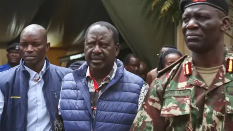 Getty Images Azimio la Umoja presidential candidate Raila Odinga (C) leaves the Supreme Court registry at the Milimani Law Courts in Nairobi after filing the election petition challenging the presidential results of the just concluded general elections in Kenya held on 9 August 2022