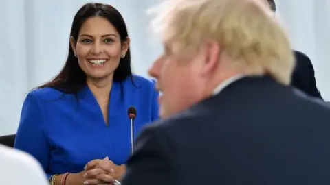 Reuters Priti Patel and Boris Johnson