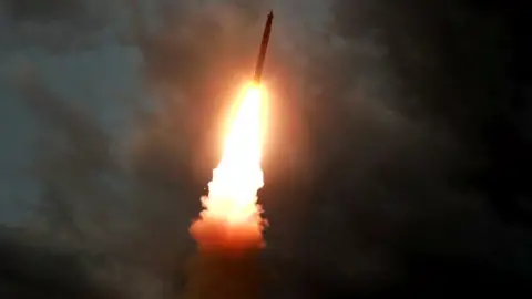 AFP A ballistic missile being launched from an unknown location in North Korea early on Wednesday